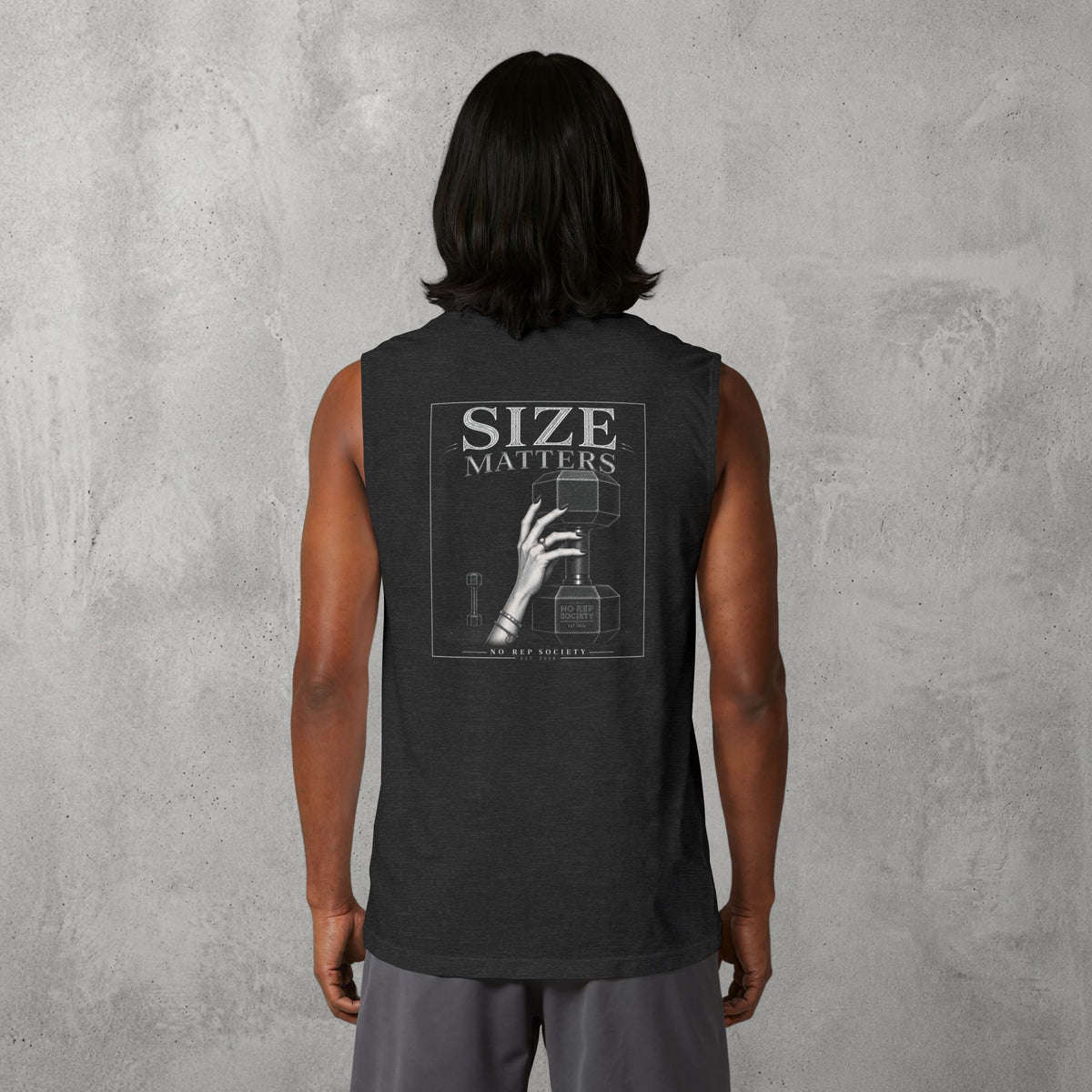 Dark Grey Heather Size Matters Muscle Tank worn by a female model, back view showing the Size Matters print.
