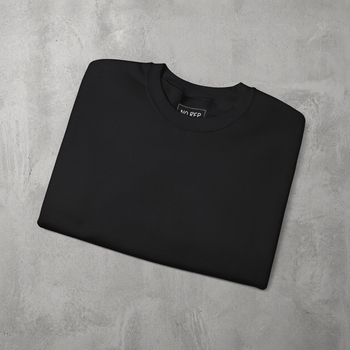 Black Destroyer of WODs (WOMEN) Crewneck by The No Rep Society, folded flat on grey concrete.