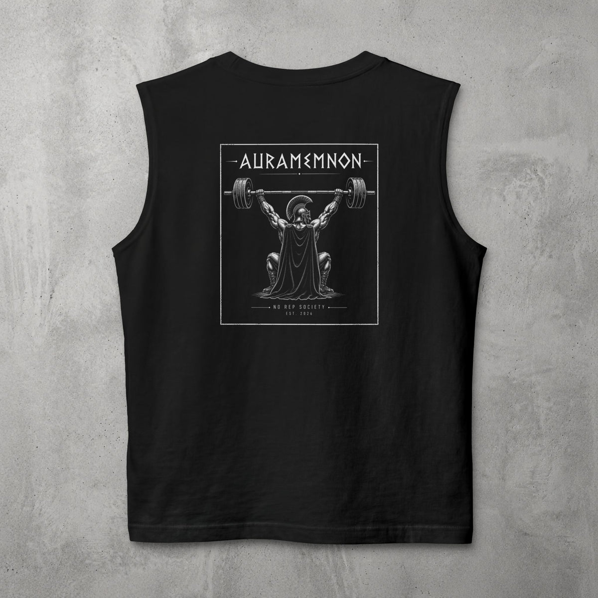 Black Auramemnon Muscle Tank by The No Rep Society, flat lay on grey concrete, back print of a caped warrior in a plumed helmet pressing a loaded barbell overhead under AURAMEMNON lettering.