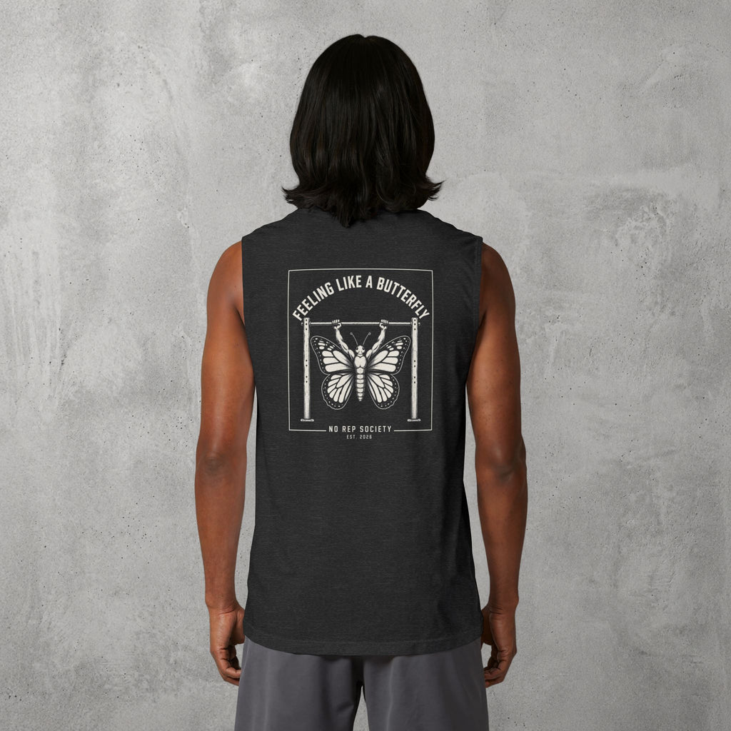 Dark Grey Heather Feeling Like A Butterfly Muscle Tank worn by a female model, back view showing the Feeling Like A Butterfly print.