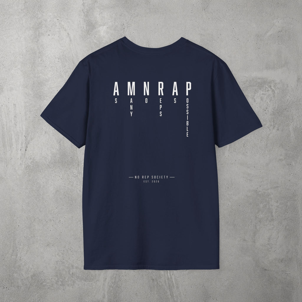 Navy AMNRAP Tee by The No Rep Society, flat lay on grey concrete, back print of AMNRAP in wide spaced capitals with AS MANY NO-REPS AS POSSIBLE set vertically between the letters.