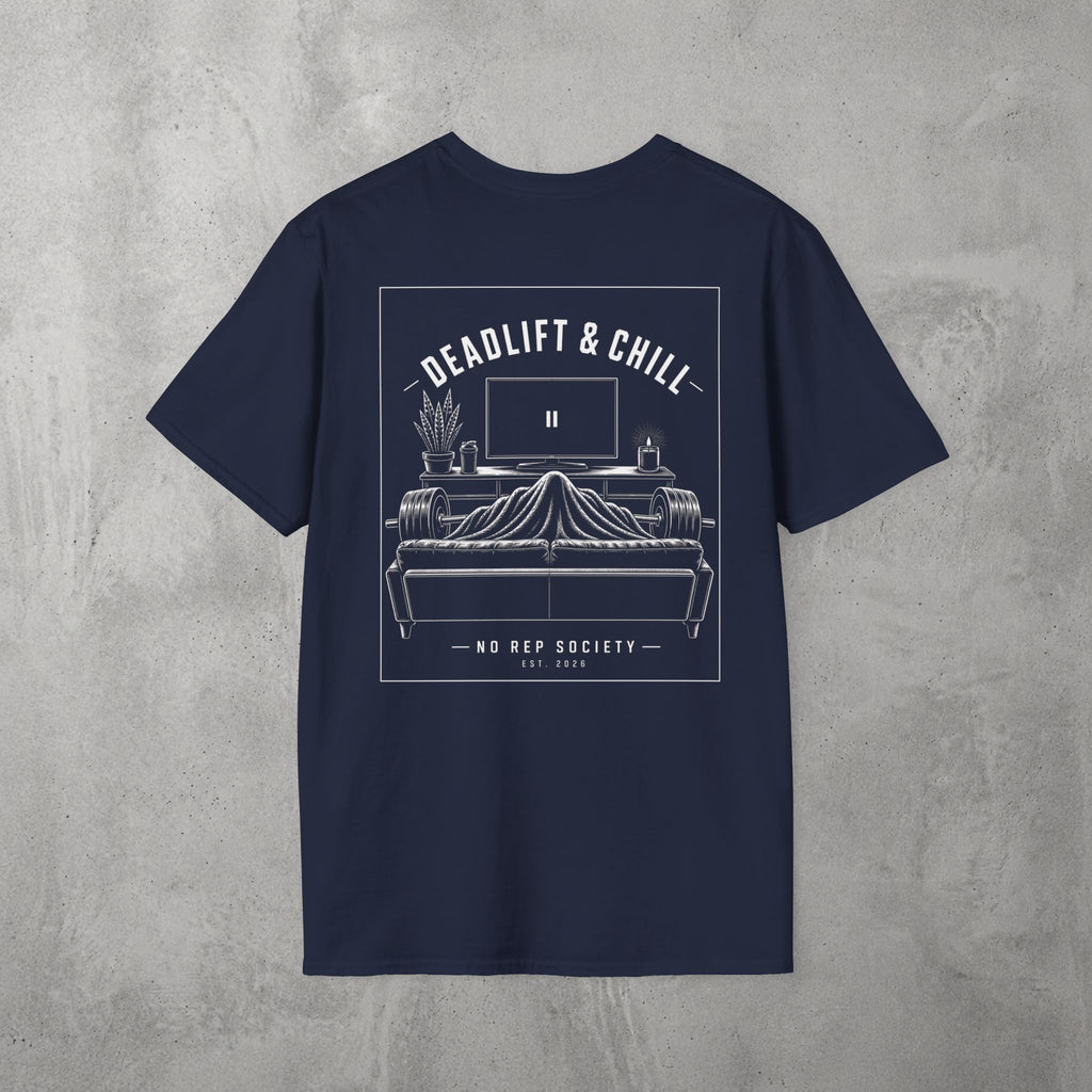 Navy Deadlift & Chill Tee by The No Rep Society, flat lay on grey concrete, back print of a bed and television drawn in fine line art under DEADLIFT & CHILL lettering.