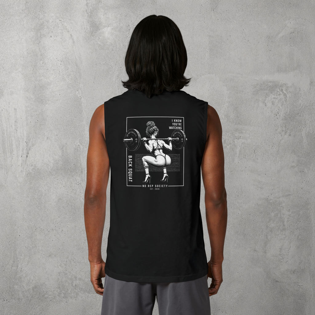 Black I Know You're Watching Muscle Tank worn by a female model, back view showing the I Know You're Watching print.