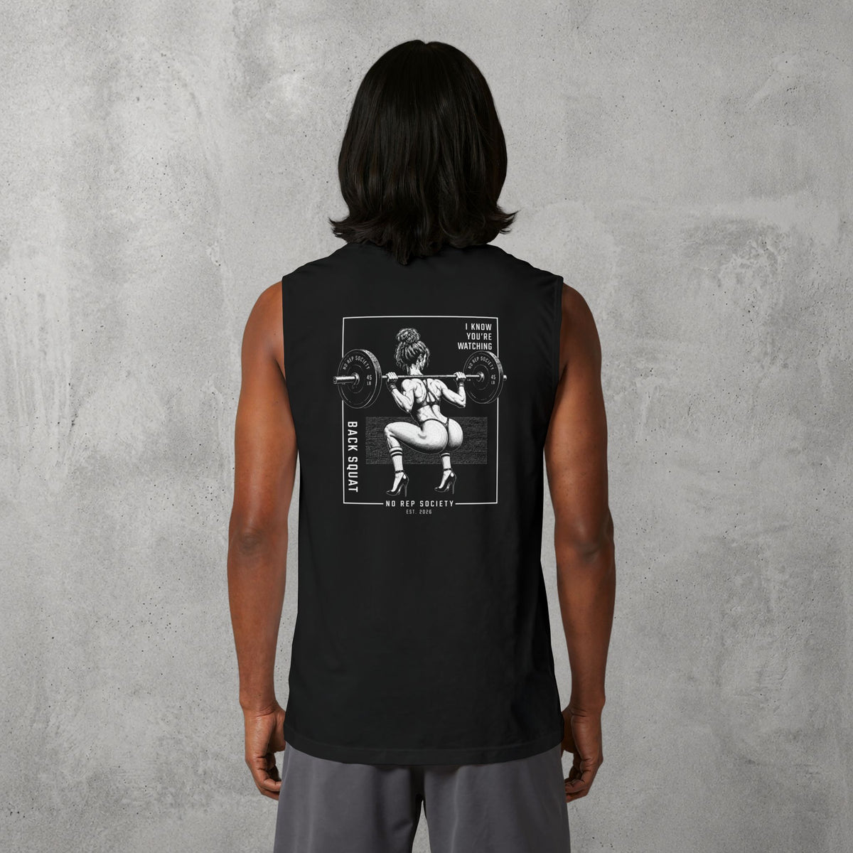 Black I Know You're Watching Muscle Tank worn by a female model, back view showing the I Know You're Watching print.