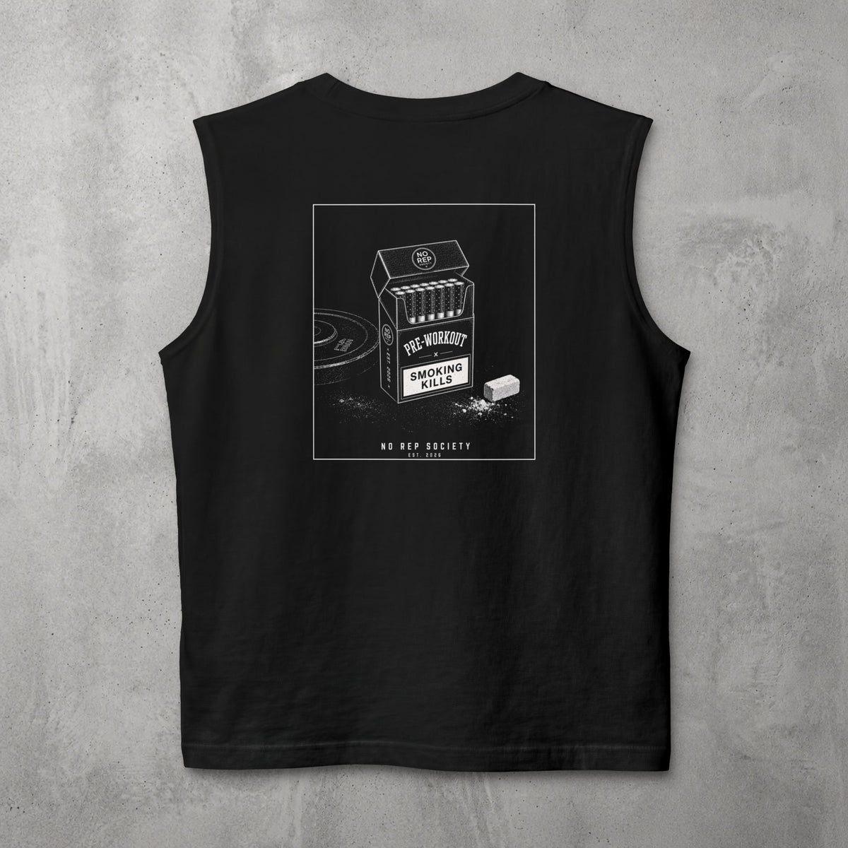 Black Pre-Workout Muscle Tank by The No Rep Society, flat lay on grey concrete, back print of an open cigarette pack labelled PRE-WORKOUT with a SMOKING KILLS warning and a scoop spilling powder.