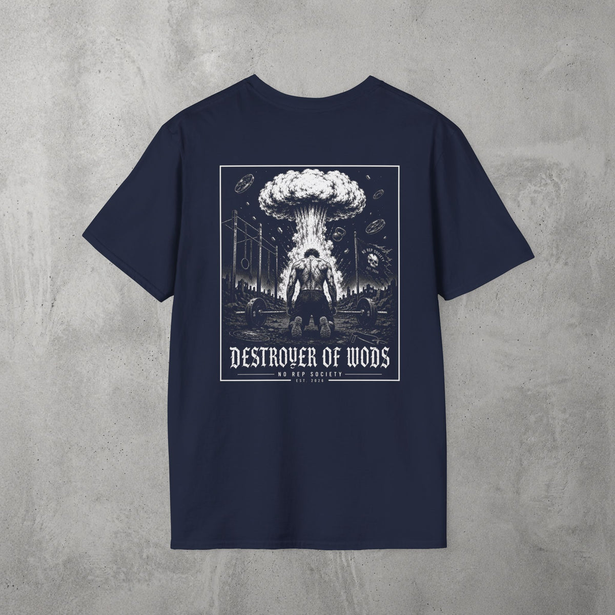 Navy Destroyer of WODs (MEN) Tee by The No Rep Society, flat lay on grey concrete, back print of a mushroom cloud rising over a lone figure under a DESTROYER OF WODS banner.