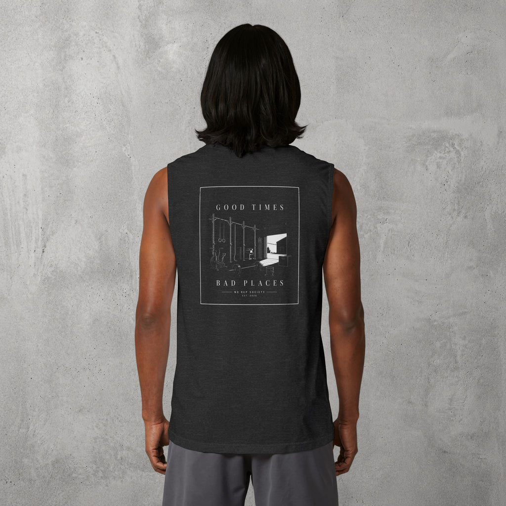 Dark Grey Heather Good Times, Bad Places Muscle Tank worn by a female model, back view showing the Good Times, Bad Places print.