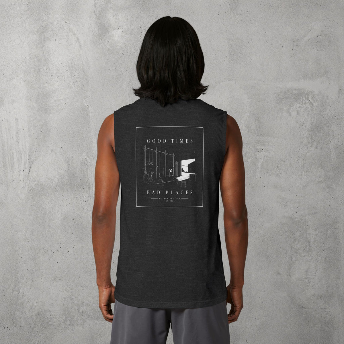 Dark Grey Heather Good Times, Bad Places Muscle Tank worn by a female model, back view showing the Good Times, Bad Places print.