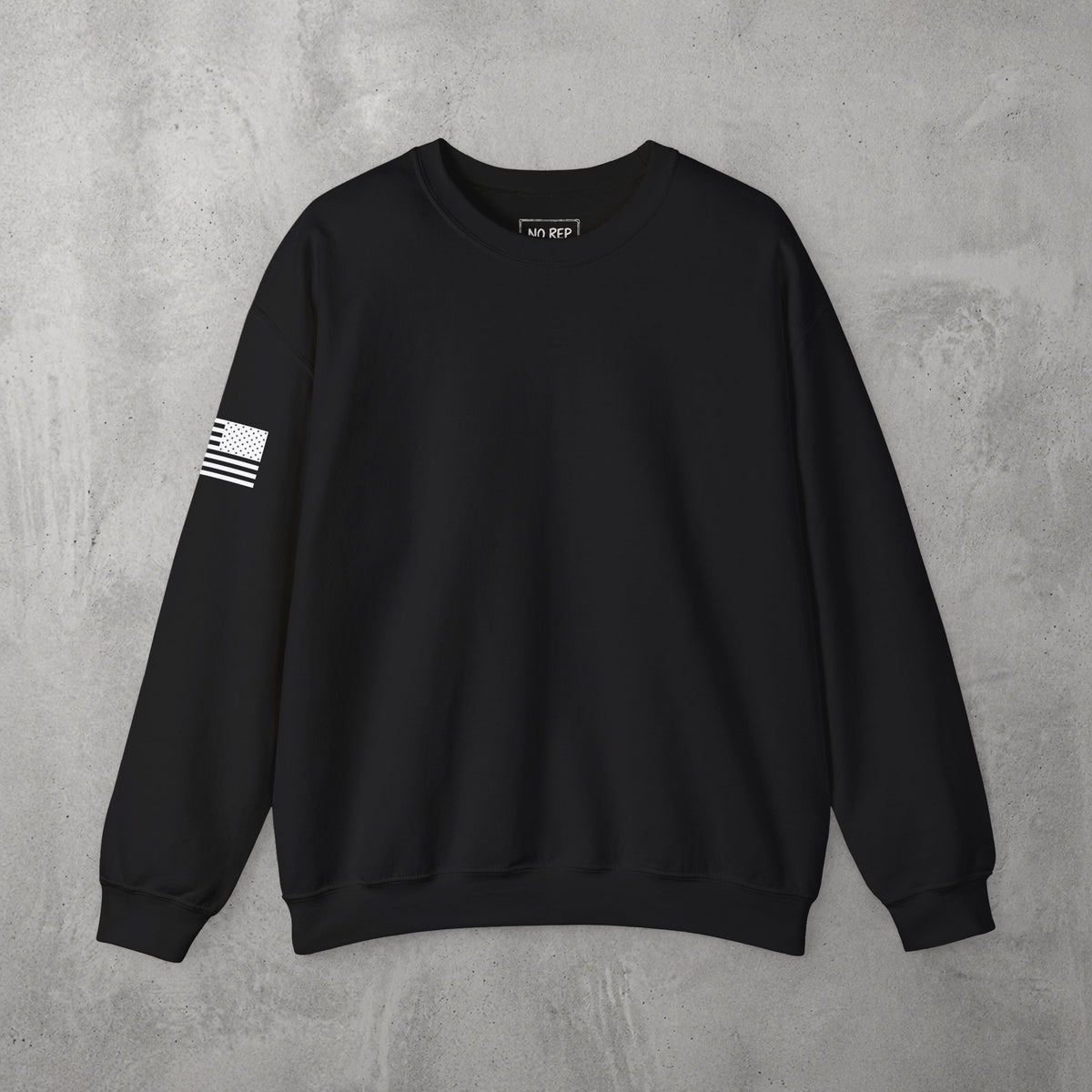 Black Chalk Addicts Crewneck by The No Rep Society, plain front view with no print, flat lay on grey concrete.