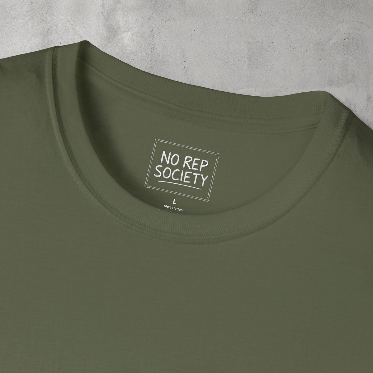 Close-up of the inner neck label of the Military Green Destroyer of WODs (MEN) Tee reading NO REP SOCIETY.