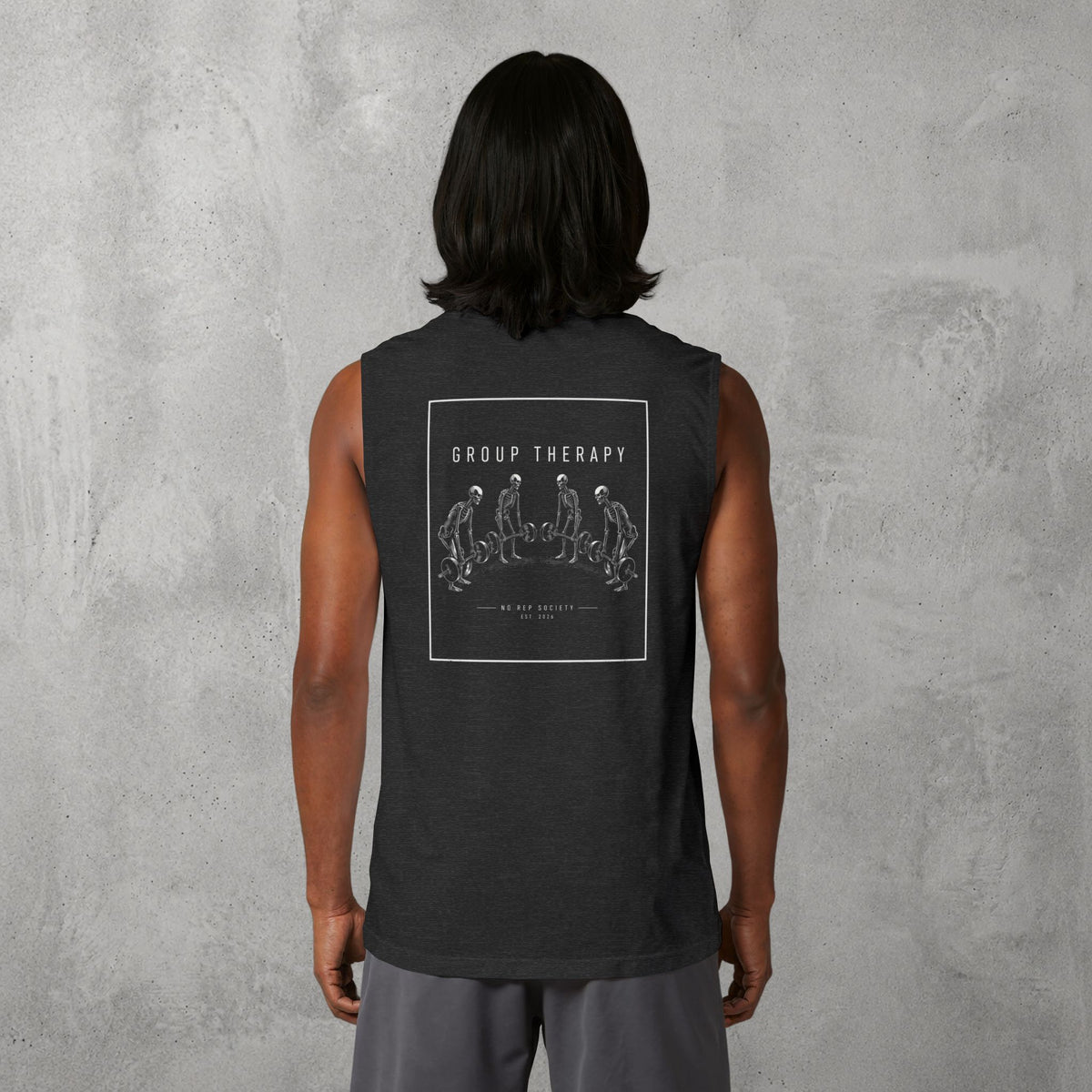 Dark Grey Heather Group Therapy Muscle Tank worn by a female model, back view showing the Group Therapy print.
