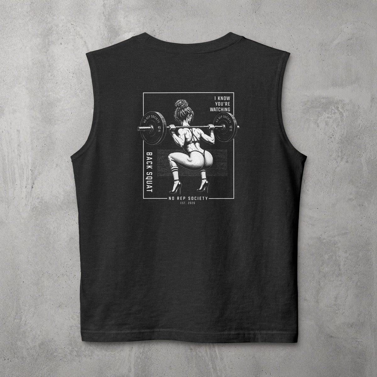 Dark Grey Heather I Know You're Watching Muscle Tank by The No Rep Society, flat lay on grey concrete, back print of a woman mid back-squat inside a bordered frame under I KNOW YOU'RE WATCHING lettering.