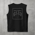 Black Group Therapy Muscle Tank by The No Rep Society, flat lay on grey concrete, back print of a circle of exhausted figures collapsed on the floor under GROUP THERAPY lettering.