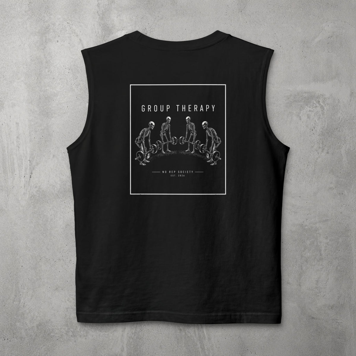 Black Group Therapy Muscle Tank by The No Rep Society, flat lay on grey concrete, back print of a circle of exhausted figures collapsed on the floor under GROUP THERAPY lettering.