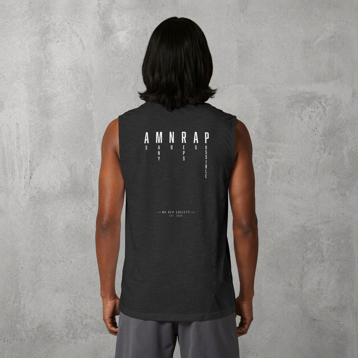 Dark Grey Heather AMNRAP Muscle Tank worn by a female model, back view showing the AMNRAP print.