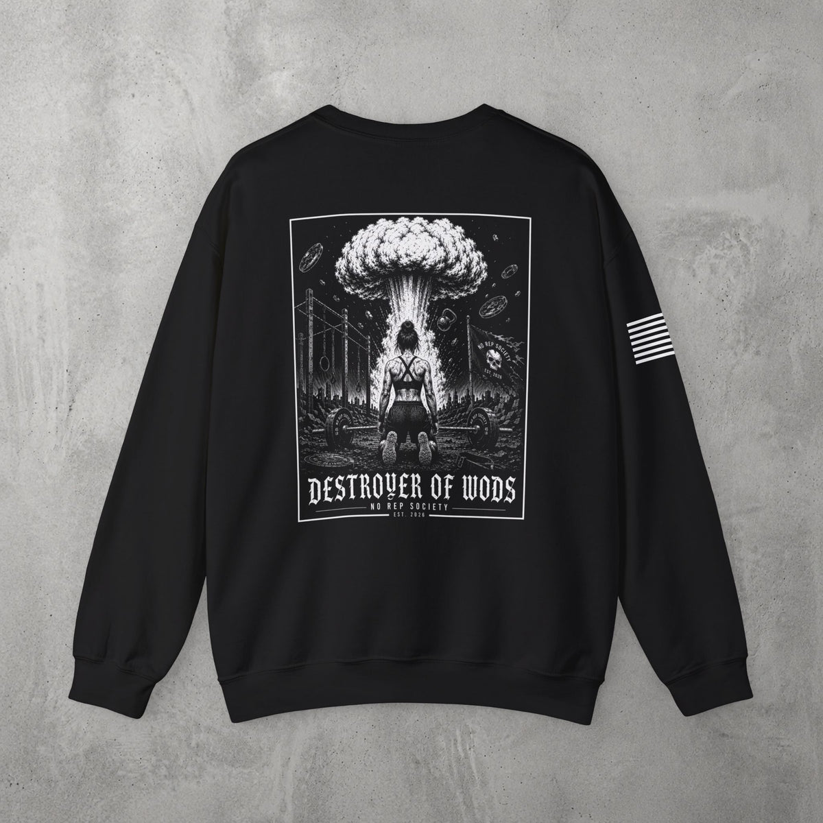 Black Destroyer of WODs (WOMEN) Crewneck by The No Rep Society, flat lay on grey concrete, back print of a mushroom cloud rising over a lone figure under a DESTROYER OF WODS banner.