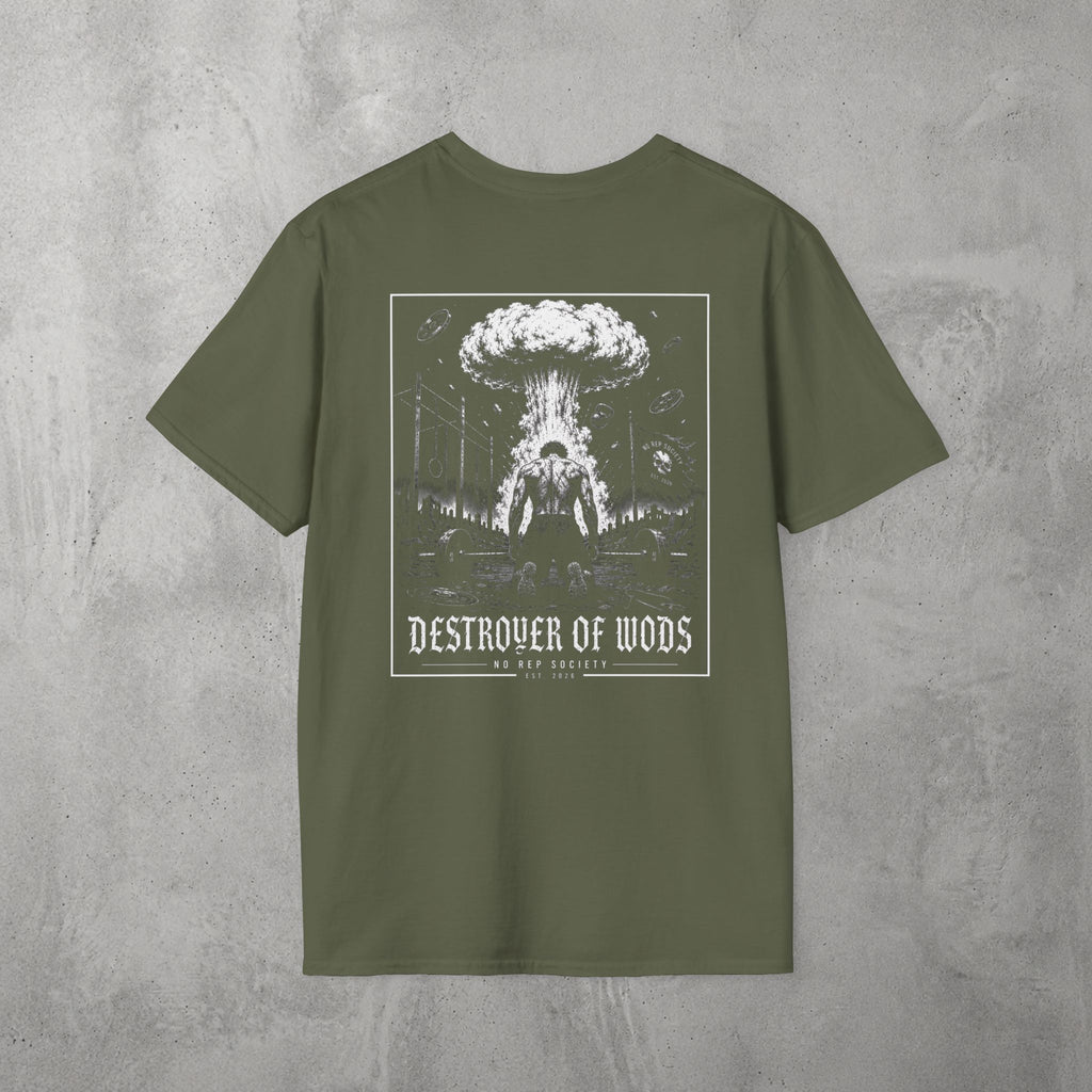 Military Green Destroyer of WODs (MEN) Tee by The No Rep Society, flat lay on grey concrete, back print of a mushroom cloud rising over a lone figure under a DESTROYER OF WODS banner.