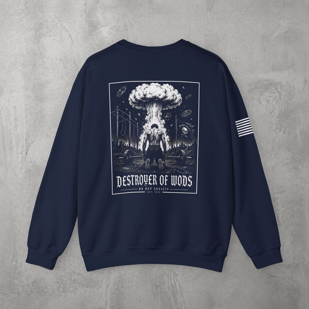 Navy Destroyer of WODs (MEN) Crewneck by The No Rep Society, flat lay on grey concrete, back print of a mushroom cloud rising over a lone figure under a DESTROYER OF WODS banner.