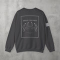 Dark Heather Group Therapy Crewneck by The No Rep Society, flat lay on grey concrete, back print of a circle of exhausted figures collapsed on the floor under GROUP THERAPY lettering.