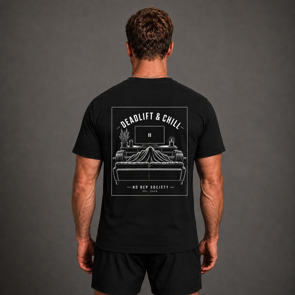 Black Deadlift & Chill Tee by The No Rep Society, worn by a male model, back view showing the DEADLIFT & CHILL print.