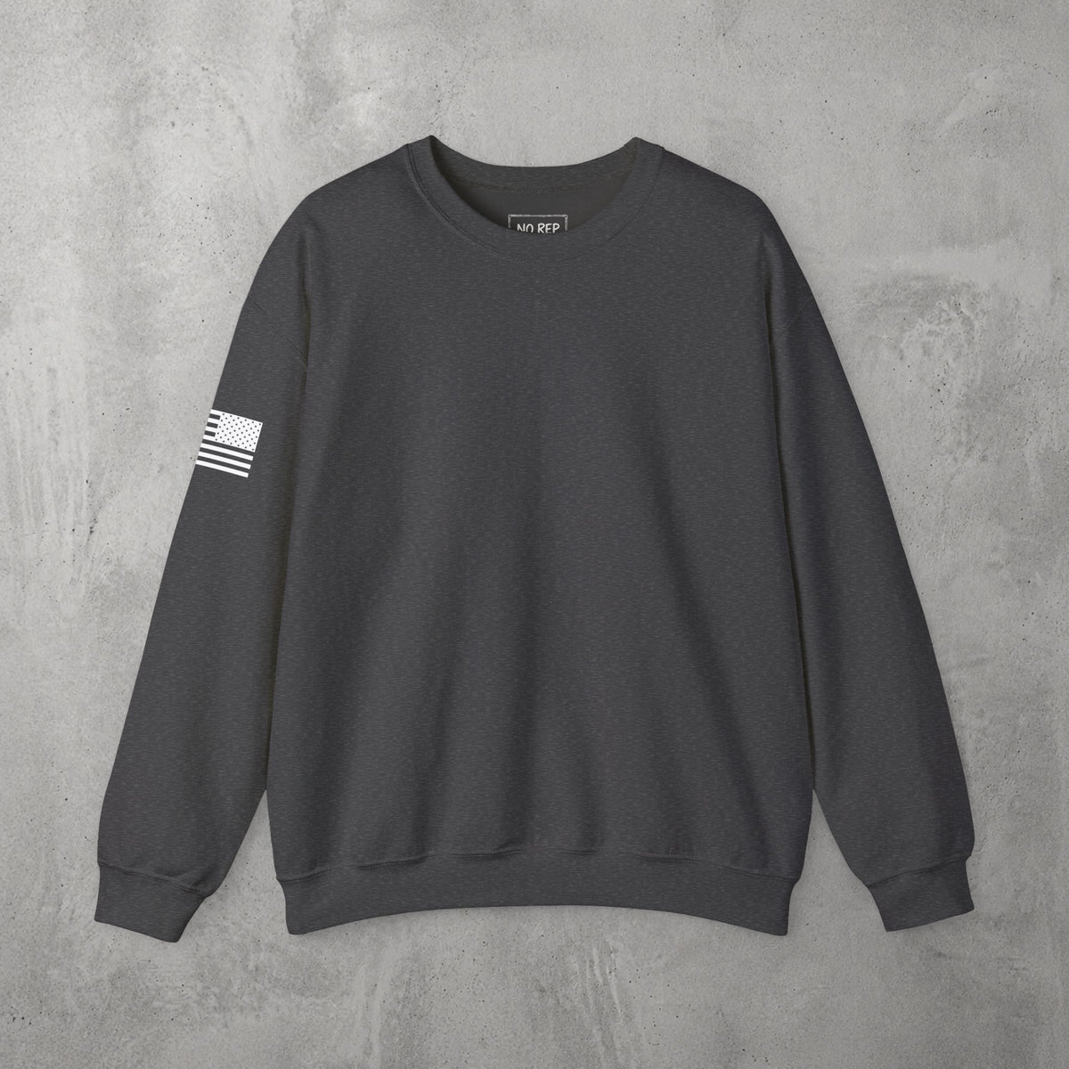 Dark Heather Chalk Addicts Crewneck by The No Rep Society, plain front view with no print, flat lay on grey concrete.