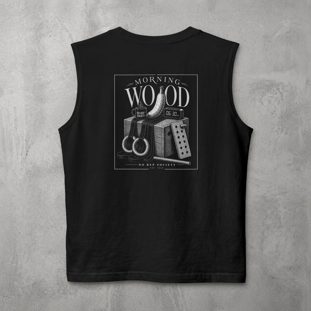 Black Morning Wood Muscle Tank by The No Rep Society, flat lay on grey concrete, back print of a banana, gymnastic rings and a wooden plyo box under MORNING WOOD lettering.
