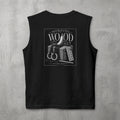 Black Morning Wood Muscle Tank by The No Rep Society, flat lay on grey concrete, back print of a banana, gymnastic rings and a wooden plyo box under MORNING WOOD lettering.