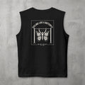 Black Feeling Like A Butterfly Muscle Tank by The No Rep Society, flat lay on grey concrete, back print of a moth with spread wings hanging between two rig uprights under FEELING LIKE A BUTTERFLY lettering.