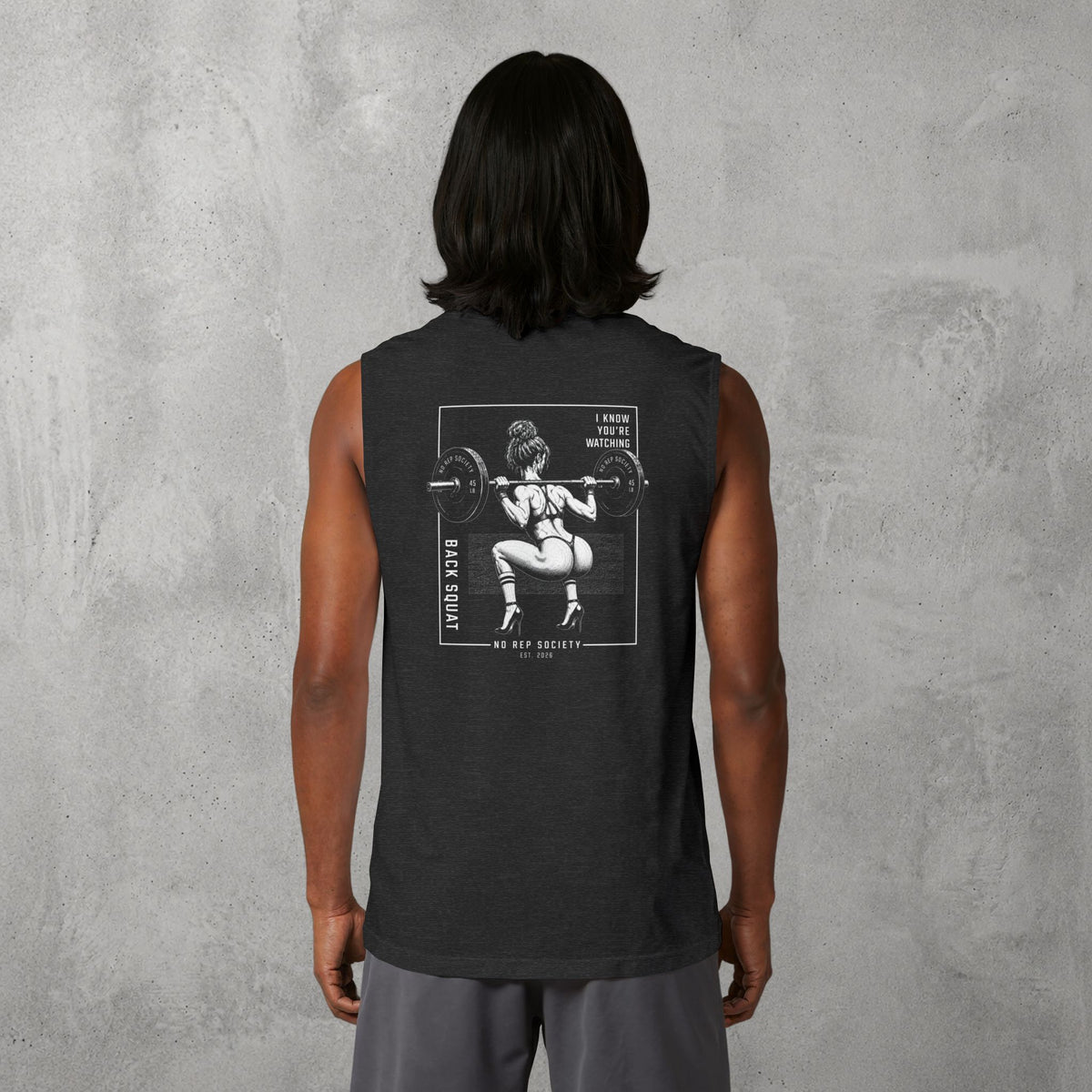 Dark Grey Heather I Know You're Watching Muscle Tank worn by a female model, back view showing the I Know You're Watching print.
