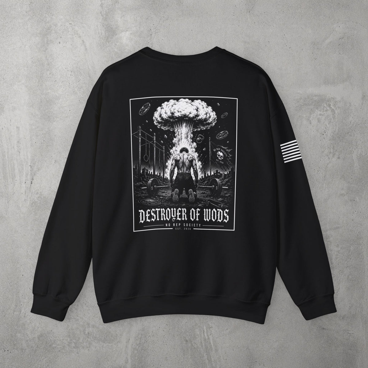 Black Destroyer of WODs (MEN) Crewneck by The No Rep Society, flat lay on grey concrete, back print of a mushroom cloud rising over a lone figure under a DESTROYER OF WODS banner.
