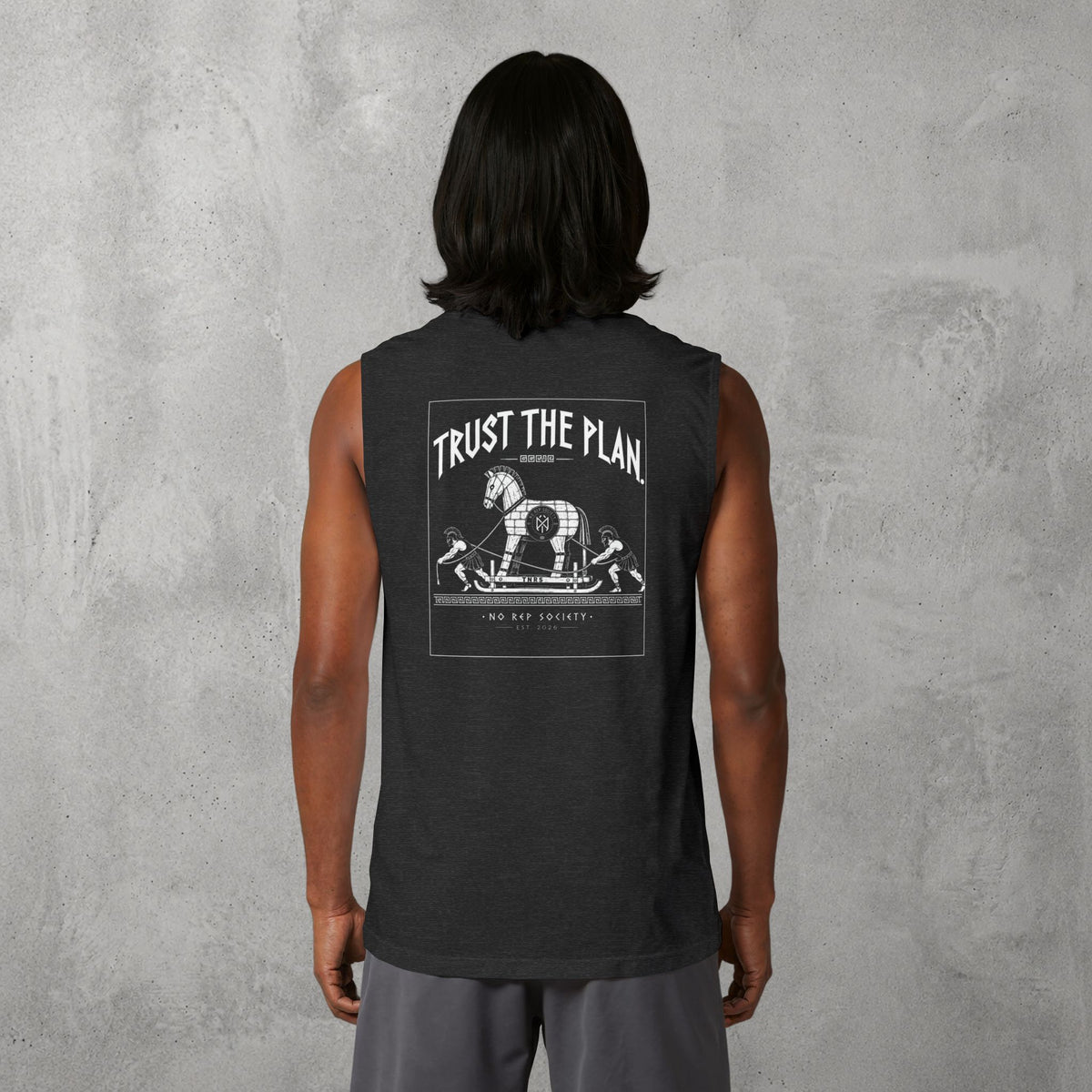Dark Grey Heather Trust The Plan Muscle Tank worn by a female model, back view showing the Trust The Plan print.