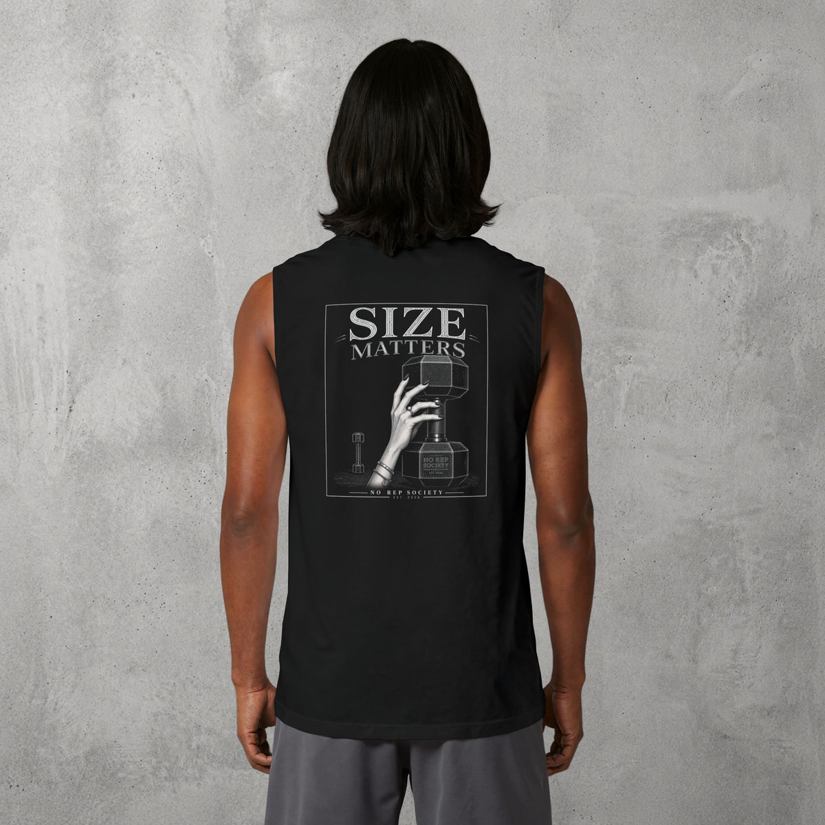 Black Size Matters Muscle Tank worn by a female model, back view showing the Size Matters print.