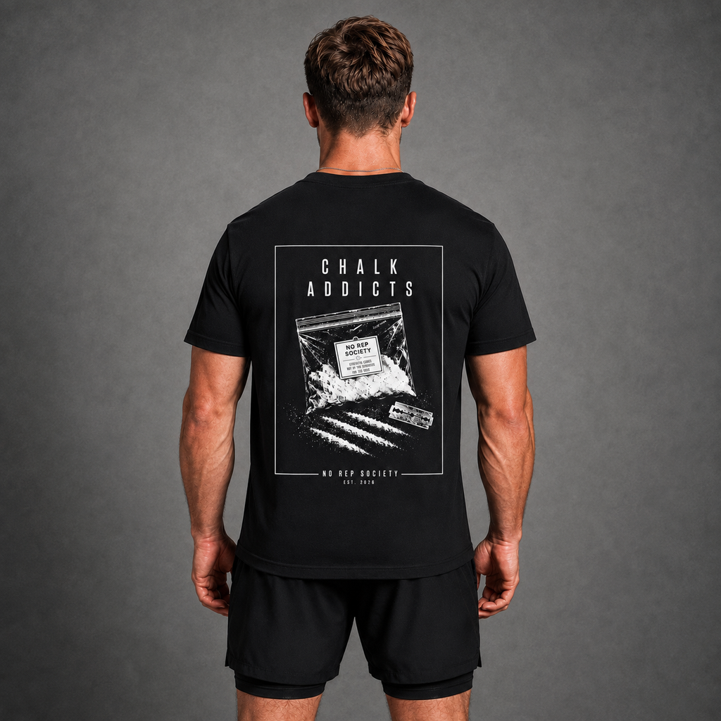 Black Chalk Addicts Tee by The No Rep Society, worn by a male model, back view showing the CHALK ADDICTS print.