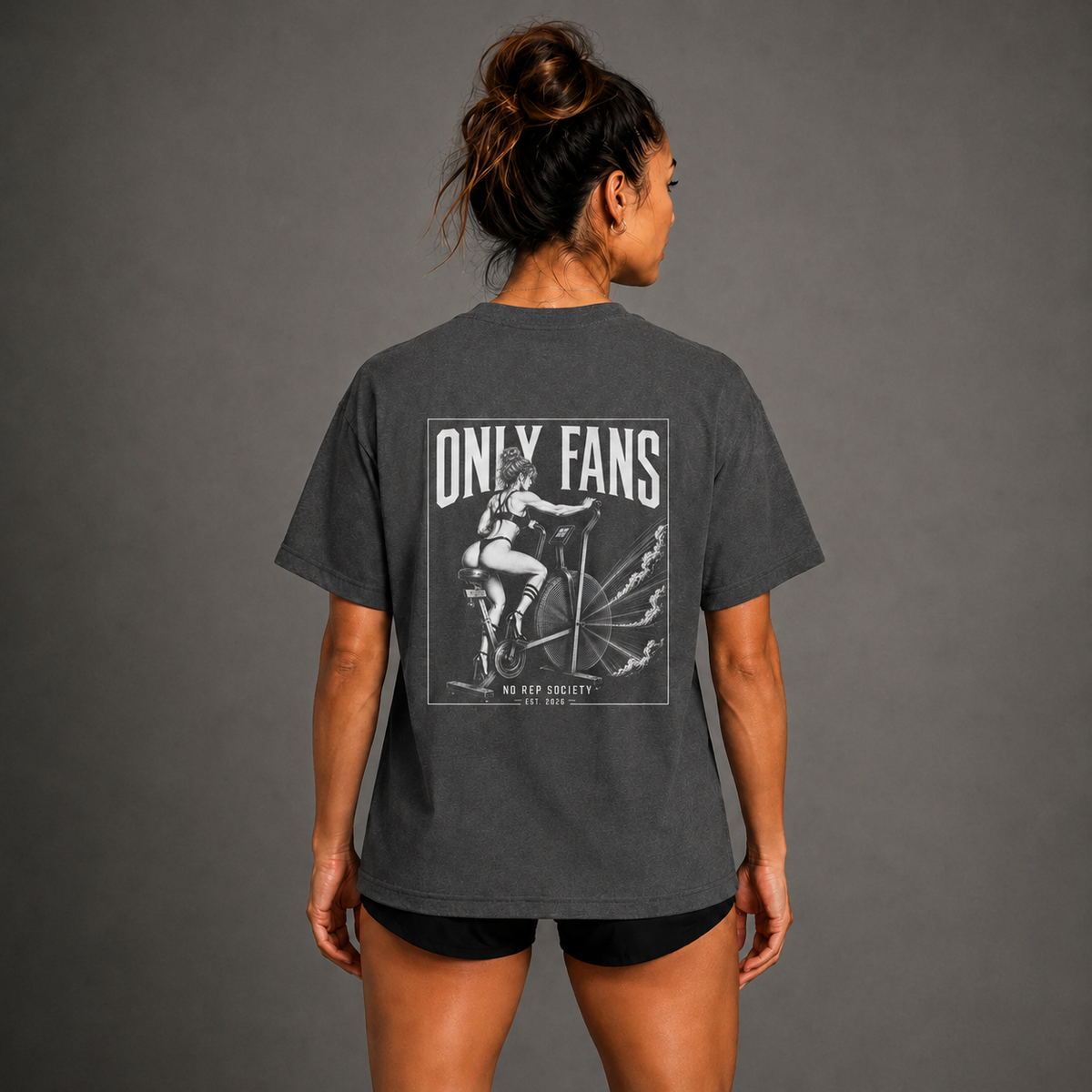 Dark Heather Only Fans Tee by The No Rep Society, worn by a female model, back view showing the ONLY FANS print.