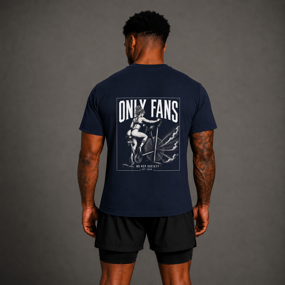 Navy Only Fans Tee by The No Rep Society, worn by a male model, back view showing the ONLY FANS print.